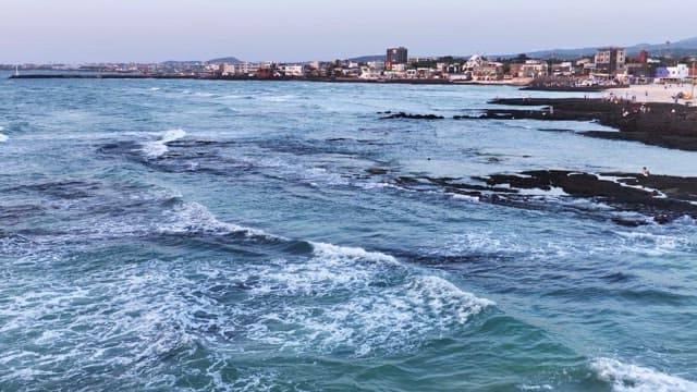 Coast with waves crashing on rocks