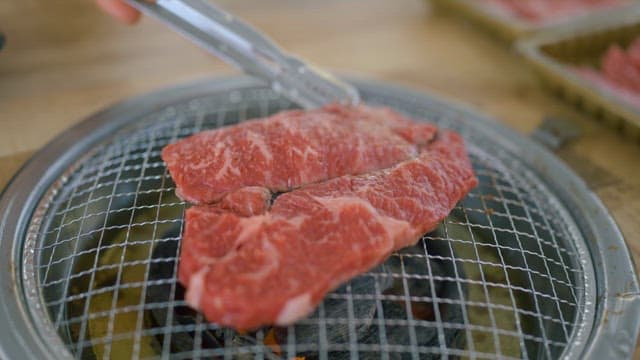 Juicy Beef Steak Grilling Over Charcoal