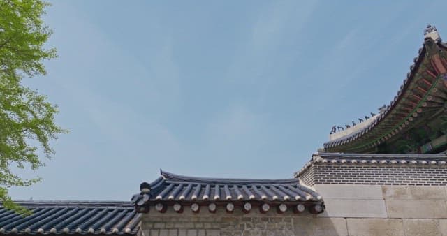 Traditional Korean architecture under a clear sky