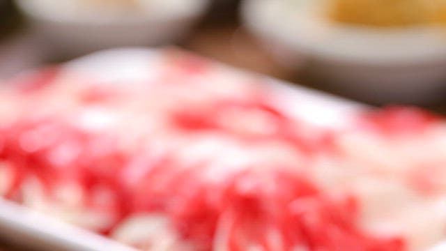 Beef brisket on a white tray