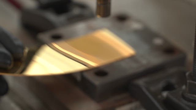 Metal sheet being precisely cut by a machine