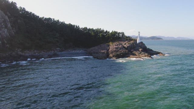 Lighthouse on a rocky coastline