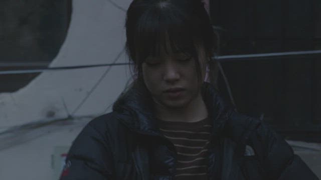 Woman lost in thought with a frustrated expression