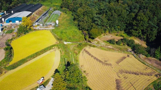 View of a mountain farm on a sunny day