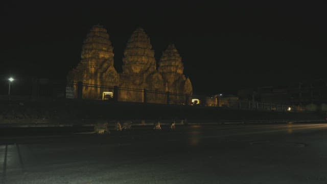 Monkeys Crossing the Road Near Ancient Temple