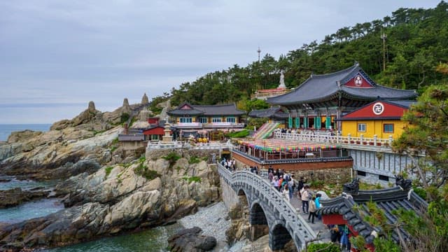 Haedong Yonggungsa Temple in Busan, located on the coast on a cloudy day, from day to night