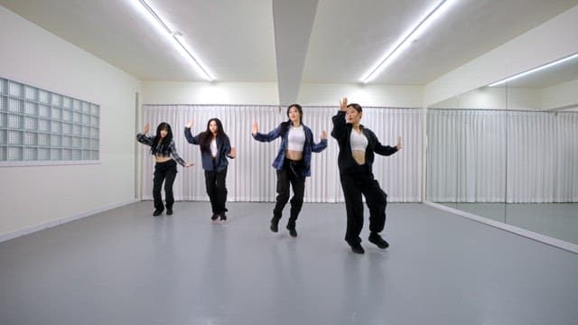 K-POP Dancers Practicing in a Studio