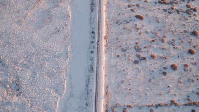 Car driving on a snowy road