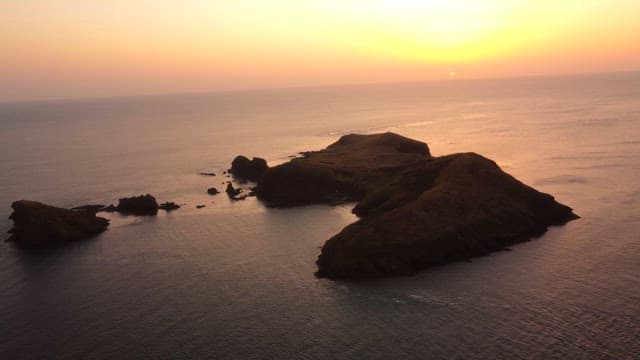 Sunset over a tranquil island and sea