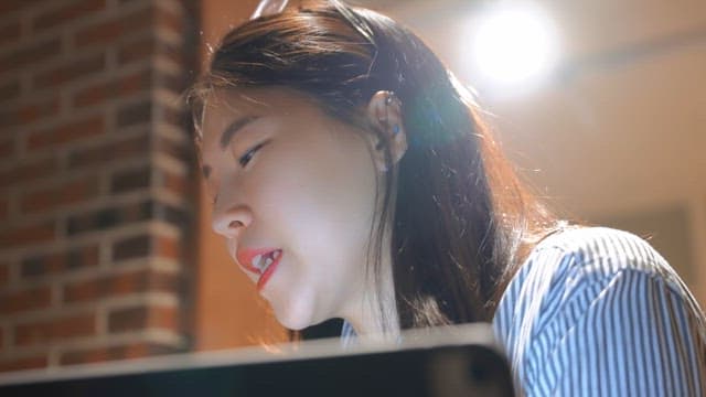 Woman in a meeting with a tablet