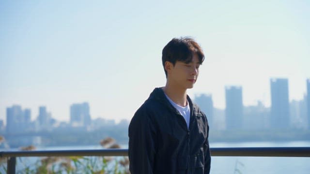 Man checking smartwatch outdoors