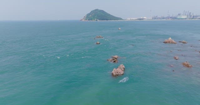 Coastal view with distant island