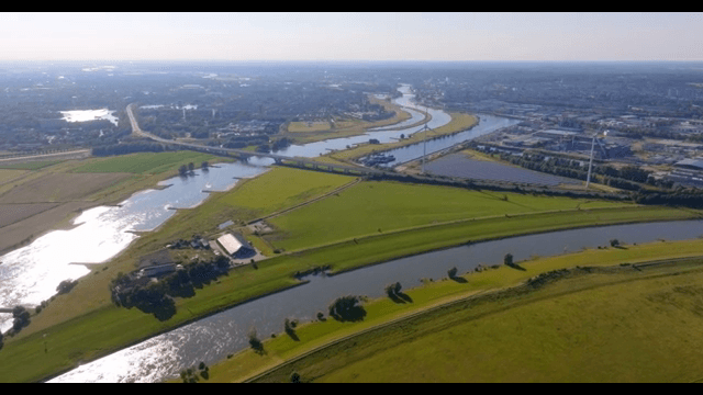 Aerial view of a suburban area with fields
