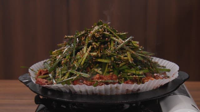 Stir-fried Webfoot Octopus Topped with Chives