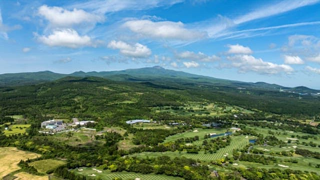 Expansive view of lush green mountains