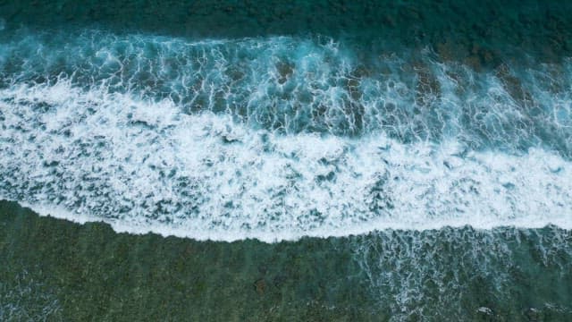 Beautiful Wave Pattern Created by Clear Blue Waves