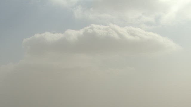 Dense Cityscape Shrouded in Haze Fog