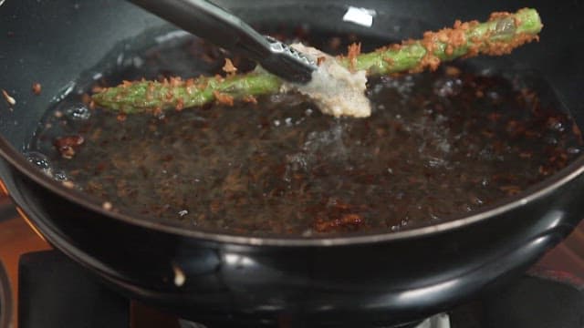 Frying Breadcrumbed Asparagus in Oil