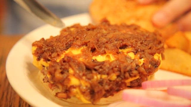 Hamburger with a juicy patty and cheese.