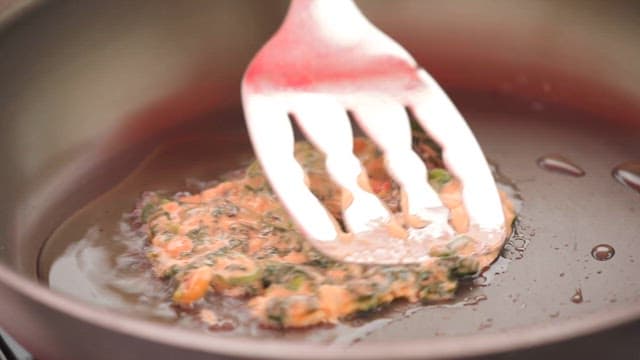 Frying Korean Thistle Pancake on a Frying Pan