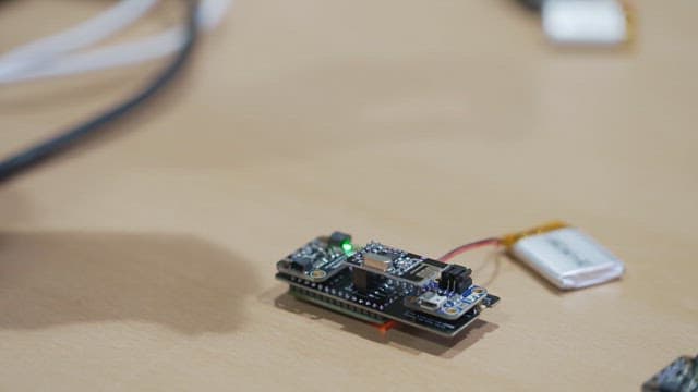 Demonstrating an electronic circuit board operation at a workstation, using a computer interface