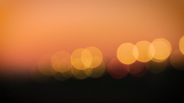 Warm Sunset Hues and Bokeh Lights