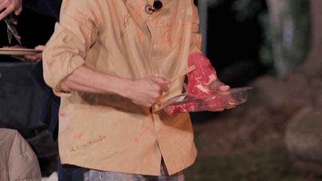 Putting Fresh Meat on an Outdoor Grill