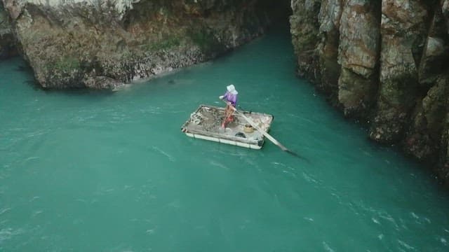 Rowing a raft on an emerald sea