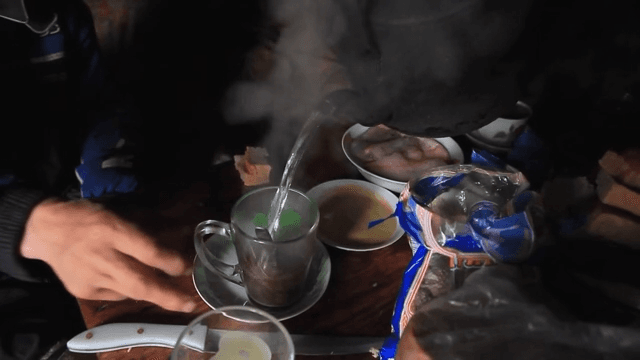 Serving Hot Tea to Guests