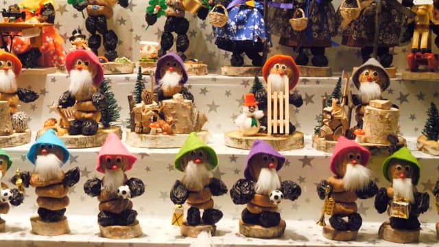 Various decorative figurines on display at the Christmas market