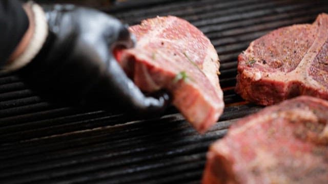 Seasoned steak grilled on the grill