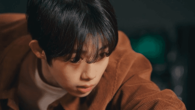 Young man focused on playing pool indoors