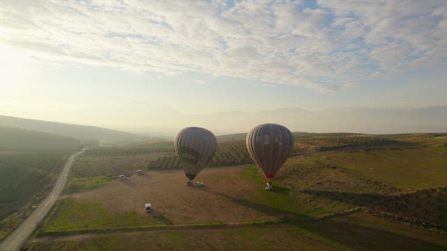 Hot Air Balloon over the Meadow on a Sunny Blue Day