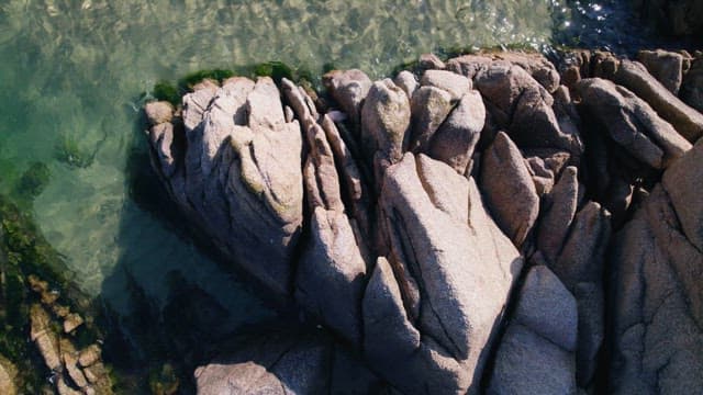 People Rocky Coastline with Clear Waters
