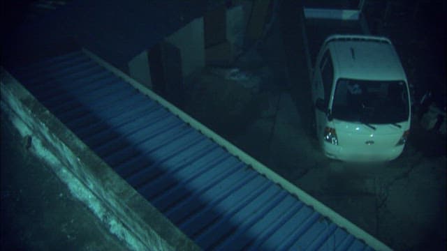 Man Pouring Suspect Powder into a Bottle of Makgeolli Late at Night