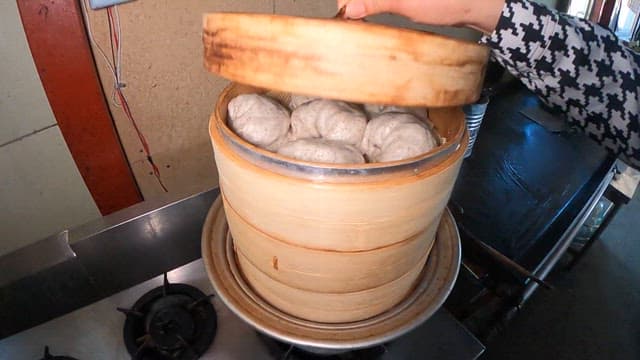 Fresh steamed dumpling in a kitchen