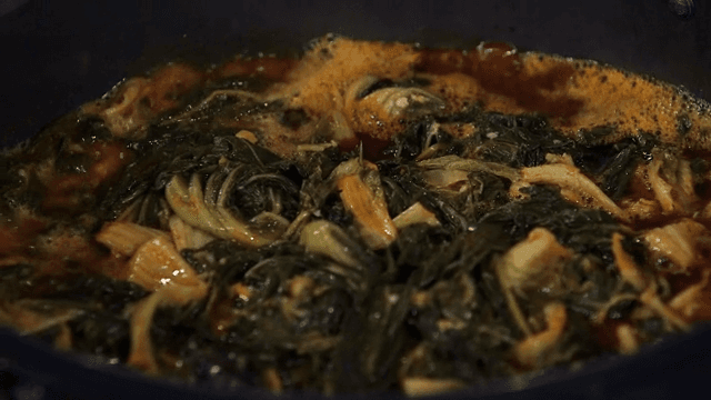 Napa cabbage boiling in a pot