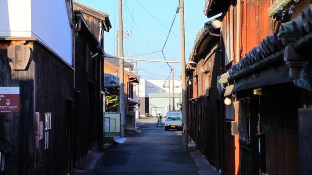 Quiet alley with traditional wooden houses