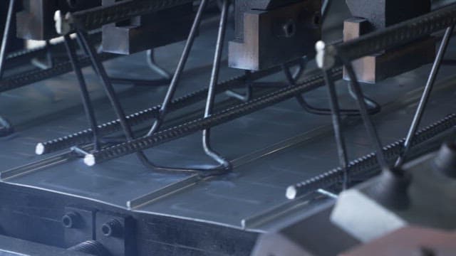 Metal being processed with sparks flying