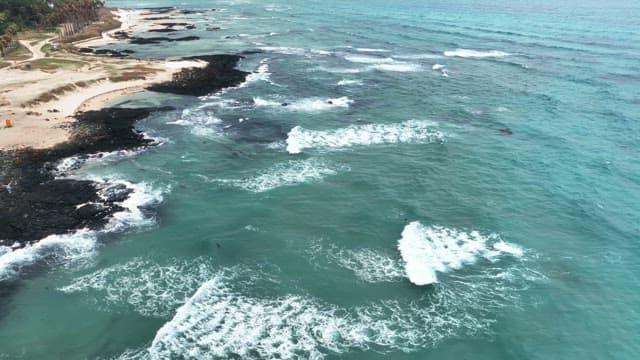 Waves crashing on a rocky coastline