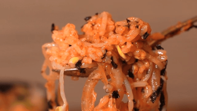 Bowl of Bean Sprouts Bibimbap Topped with Red Pepper Paste