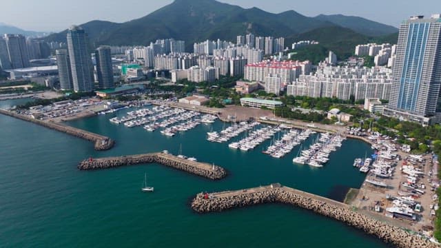 Busan's coastline with skyscrapers, and yacht marinas