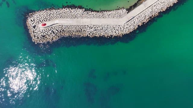 Coastal village with breakwaters