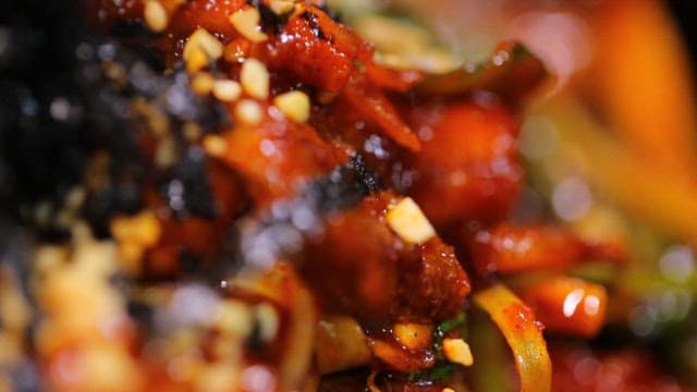 Appetizing and spicy grilled pork with seasoned deodeok