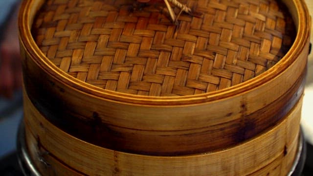 Steaming Hot Dumplings in Bamboo Steamers