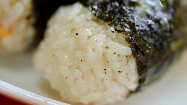 Close-up of rice balls wrapped in seaweed