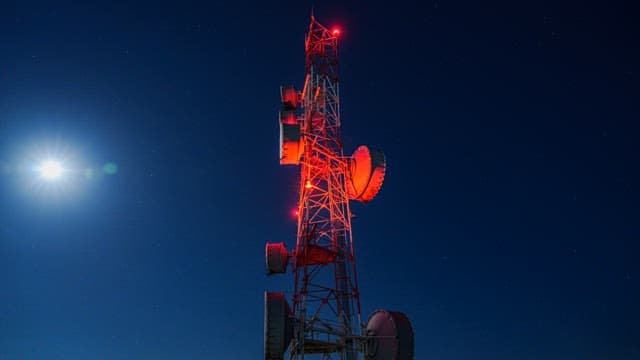 Star Trails Over a Radio Tower at Night