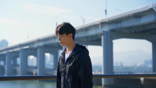 Man checking smartwatch outdoors