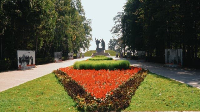 Morning view with memorial statues in the park