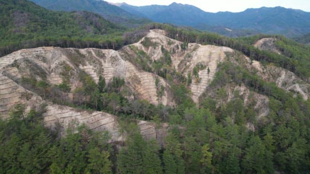 Desolate mountain with all the trees cut down